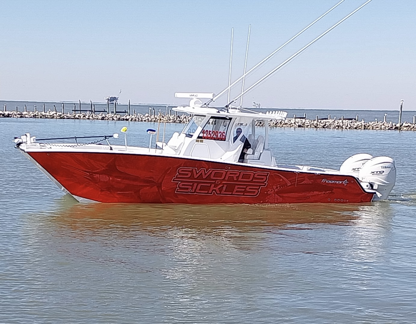 swords and sickles boat